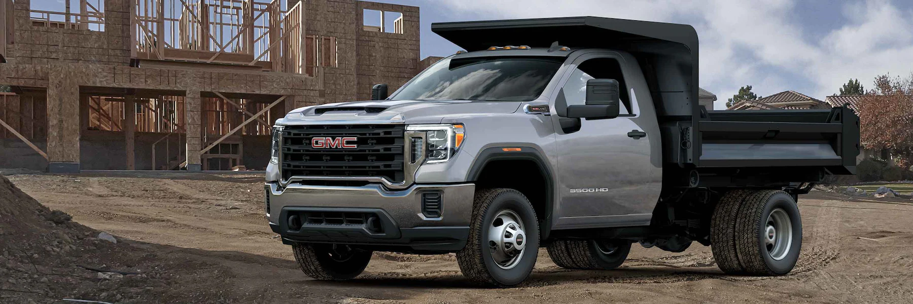 The 2023 GMC Sierra 3500 Chassis Cab at a jobsite.